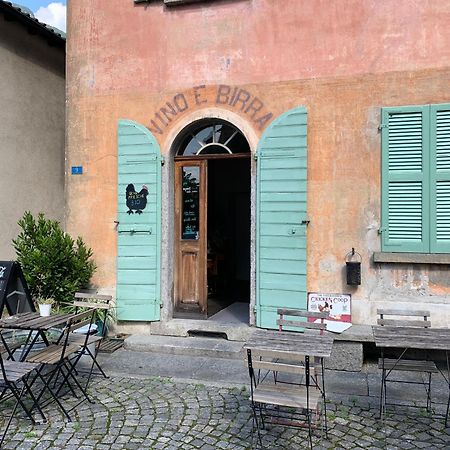 Casa Vino E Birra Aparthotel Osogna ภายนอก รูปภาพ